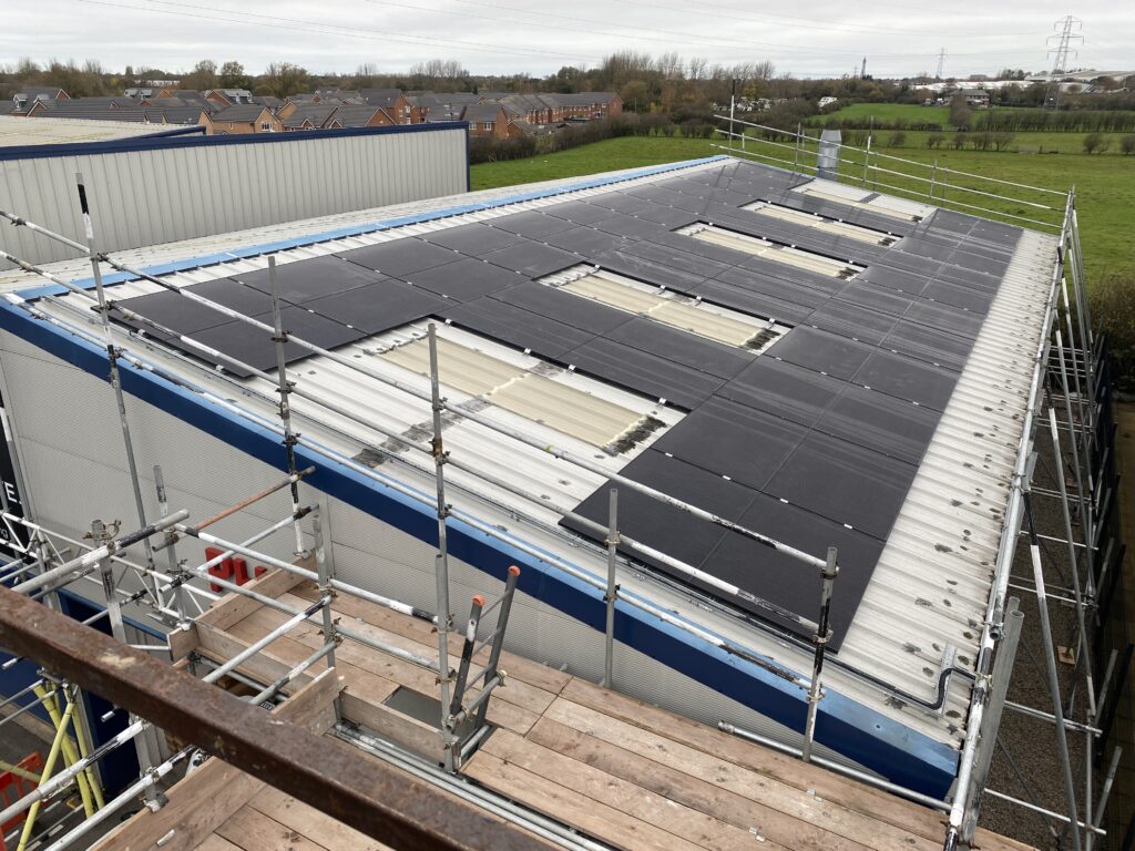 Solar panels being installed on a commercial premises.
